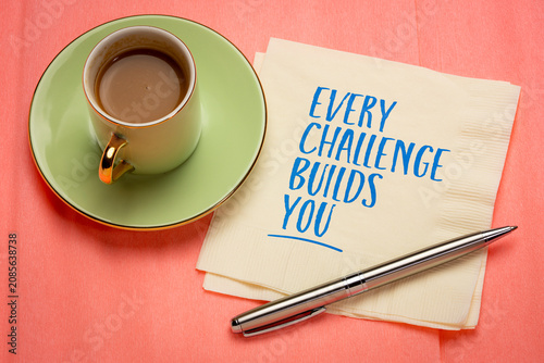 Fotografía Every Challenge Builds You - inspirational handwritten note on a napkin with coffee and pen, symbolizing resilience, courage, growth, and lifelong learning