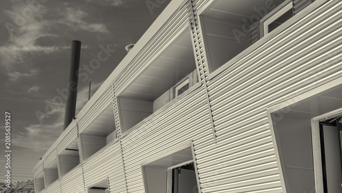 Konstfotografi Construction site details showing stacked materials, steel structures, and ongoi