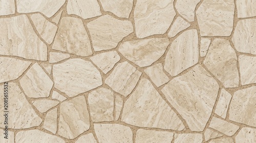 Irregular beige travertine stone wall texture background, natural flagstone paving pattern, crazy paving exterior cladding