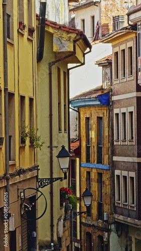 Narrow historic street between old buildings
