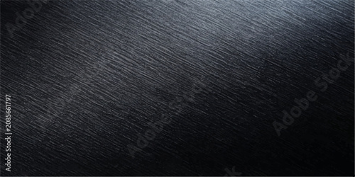 Bild auf Leinwand Textured dark brushed metal surface, reflecting subtle light, offering a sophisticated and industrial background with fine linear scratches, conveying strength and a modern aesthetic