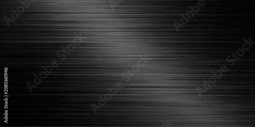 Obraz na plátně Brushed dark metal surface with a light streak across, a texture that exudes a sleek and industrial feel