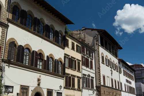 White buildings lining the famous piazza di san lorenzo in Florence italy.