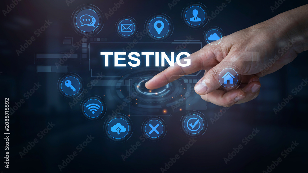 Fototapeta premium A person interacting with a futuristic digital interface featuring the word testing surrounded by various abstract blue technology icons in a dark space