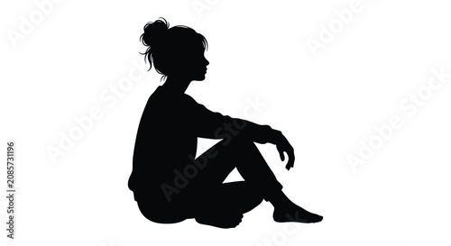 Tableau sur toile Seated woman in a contemplative pose black silhouette