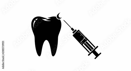 Photos Tooth receives a numbing injection from a medical syringe during a standard dental surgery procedure