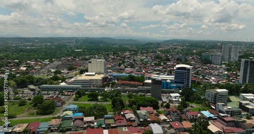 Business and residential buildings in Davao City. Skyline. Blue sky with clouds. Mindanao, Philippines.