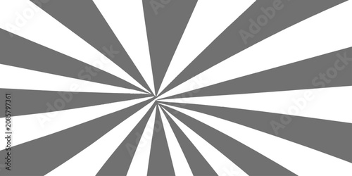 Radial burst of grey and white stripes emanating from a central point during a graphic design