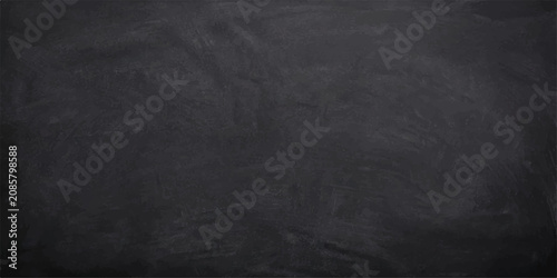 Textured blackboard background with chalk dust for creative educational concepts