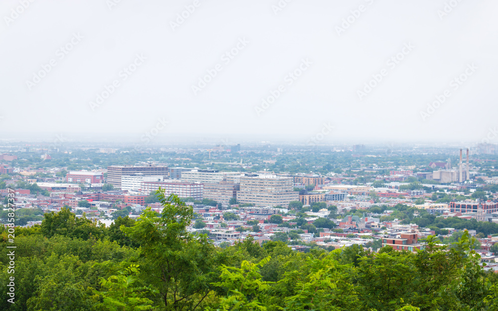 Fototapeta premium Skyline of Montreal, Canada in a cloudy day, Sunset