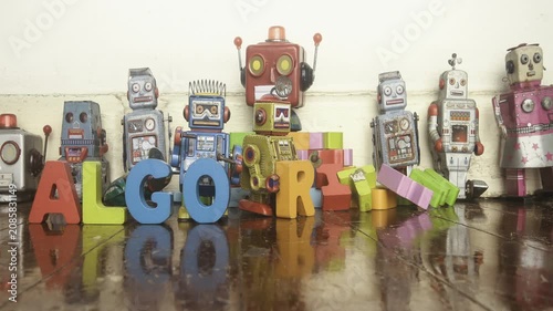 The word ALGORITHMS with retro robot toys stop motion 