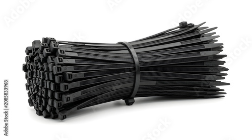 A bundle of black cable ties neatly organized on a white surface