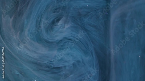 Paint haze. Swirl blue vapor. Defocused color glitter cloud splash sparkling liquid drop spreading on abstract art bokeh background.