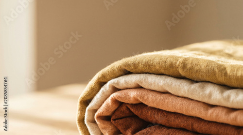 Layered warm-toned cotton quilting fabrics in minimalist style  