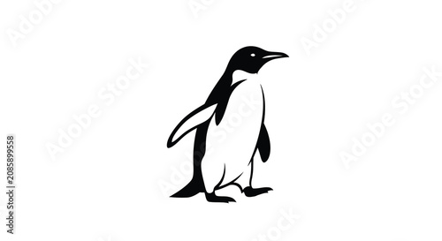 Obraz na płótnie A black penguin silhouette stands on white a minimalist vector illustration with