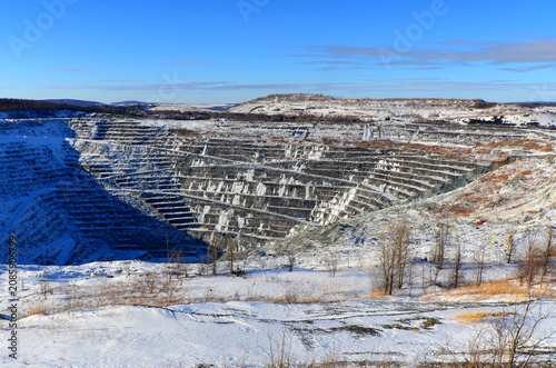 Aerial view of Asbestos mine, Asbestos, Quebec, Canada. Asbestos is a set of six naturally occurring silicate minerals used commercially for their desirable physical properties.