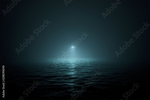 Mysterious ocean scene a soft light illuminates the dark waters in a foggy atmosphere creating an enigmatic and serene environment