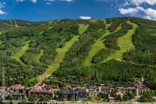 Vail, Colorado on a Sunny Summer Day with Ski Runs in the Background