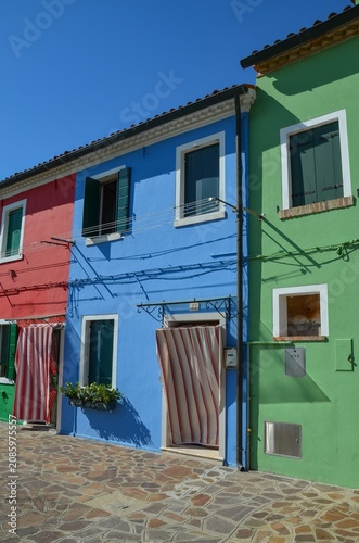 Italy, Burano, October 01, 2025 a picturesque, attractive island near Venice with colorful and bright little houses