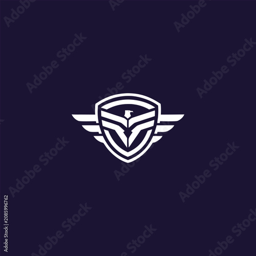 Dynamic eagle shield emblem logo design with outstretched wings, brand identity, security services icon, sports team mascot, aviation industry symbol, business mark,   tech startup, finance
