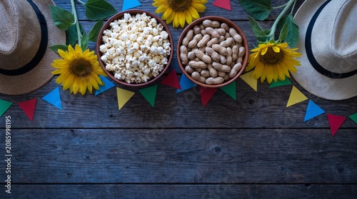 Festa Junina decorations with popcorn peanuts sunflowers and hats