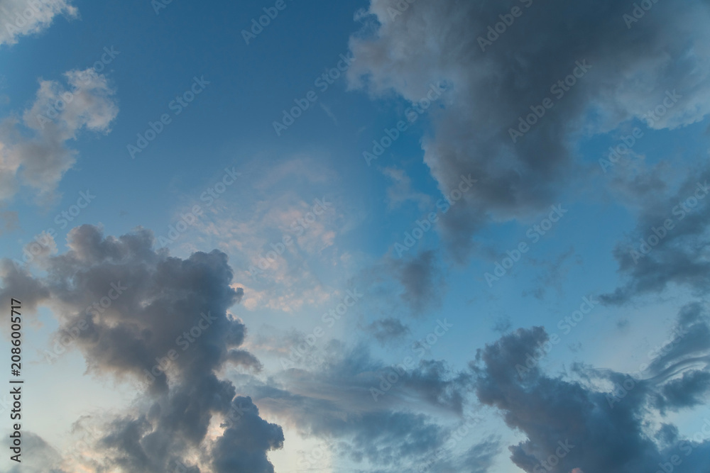 Fototapeta premium Beautiful bright sunset with colorful dramatic clouds. Sky clouds background.
