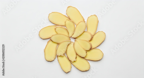 Sliced ginger root arrangement on white background culinary ingredient natural food presentation