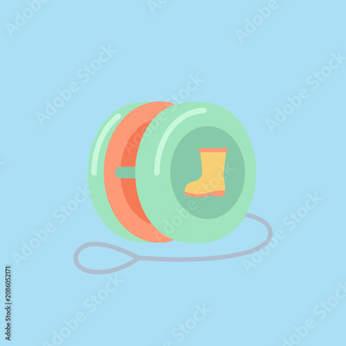A colorful toy yo-yo with a boot icon on the side