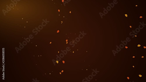 A scattering of glowing orange leaves floating in a deep dark background