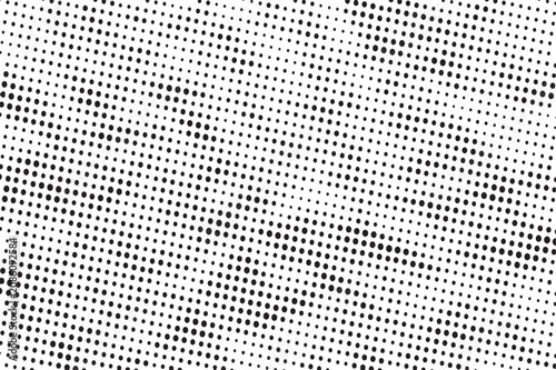 Halftone pattern with small black dots on white background