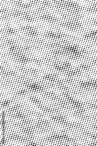 Halftone pattern with small black dots on white background