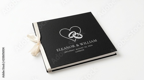 Elegant wedding album, black hardcover photo book with white ribbon, personalized keepsake for married couples, romantic anniversary gift idea, engagement celebration memory book.