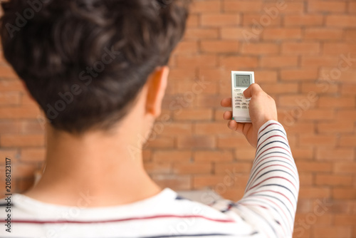 Person adjusting air condit...