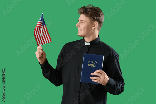 Male priest with USA flag a...