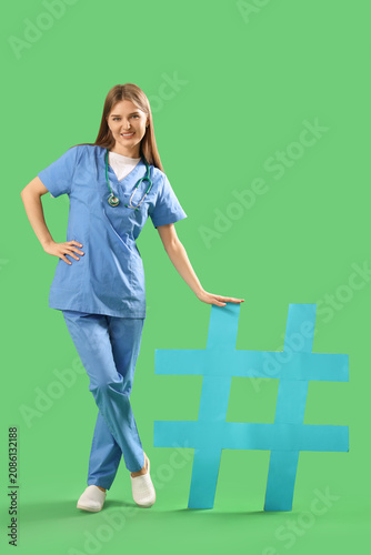 Young female doctor with st...