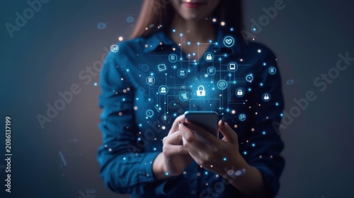 Smartphone user engages with a glowing holographic security interface featuring complex digital icons and vibrant blue light nodes floating above the screen in a dark environment.