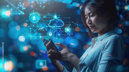 Young woman engages with a cloud computing interface projected in glowing blue light while holding her smartphone in a dark environment filled with soft out of focus circular highlights.
