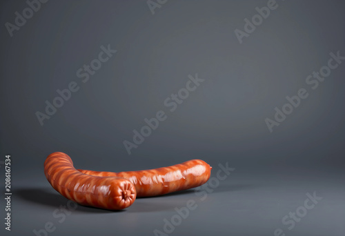 Two blood sausages on gray ...