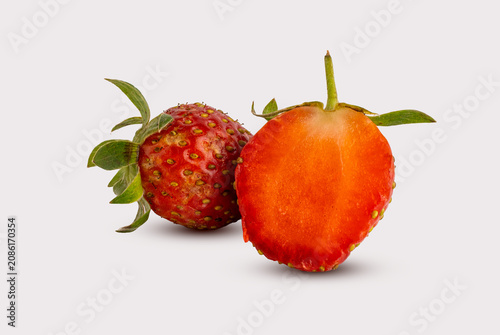 Fresh Ripe Strawberry Whole and Sliced in Half Isolated on White Background