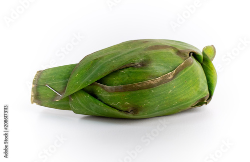 Single Indonesian Lemper Snack Wrapped in Banana Leaf Isolated