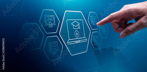 Online education e learning concept with business hand touching virtual graduation laptop interface showing certificate checklist video lesson webinar and digital training icons