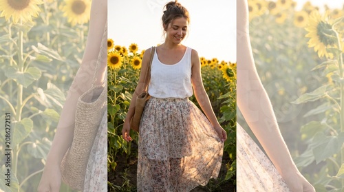 Happy young woman walking through vibrant yellow sunflower field at summer golden hour