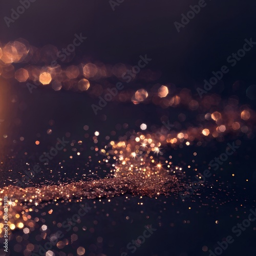 close up of scattered glitter trail on dark surface sparkling light reflection magical bokeh background whimsical