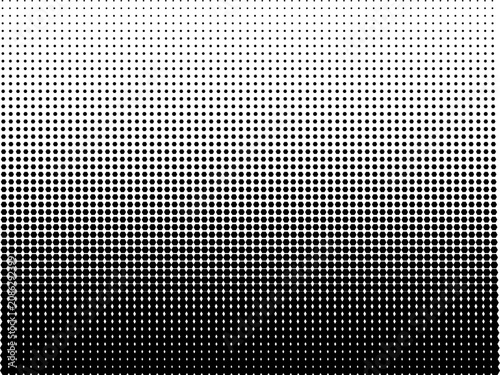 Fotografie Halftone gradient pattern with black and white dots  seamless design element