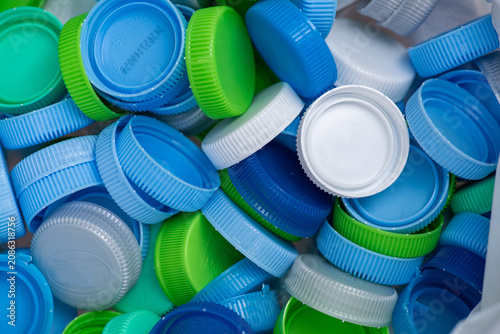 plastic bottle caps waiting to be taken to recycle.