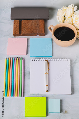 Принти на полотні Colorful desk with stationery in trinket design style vertical view