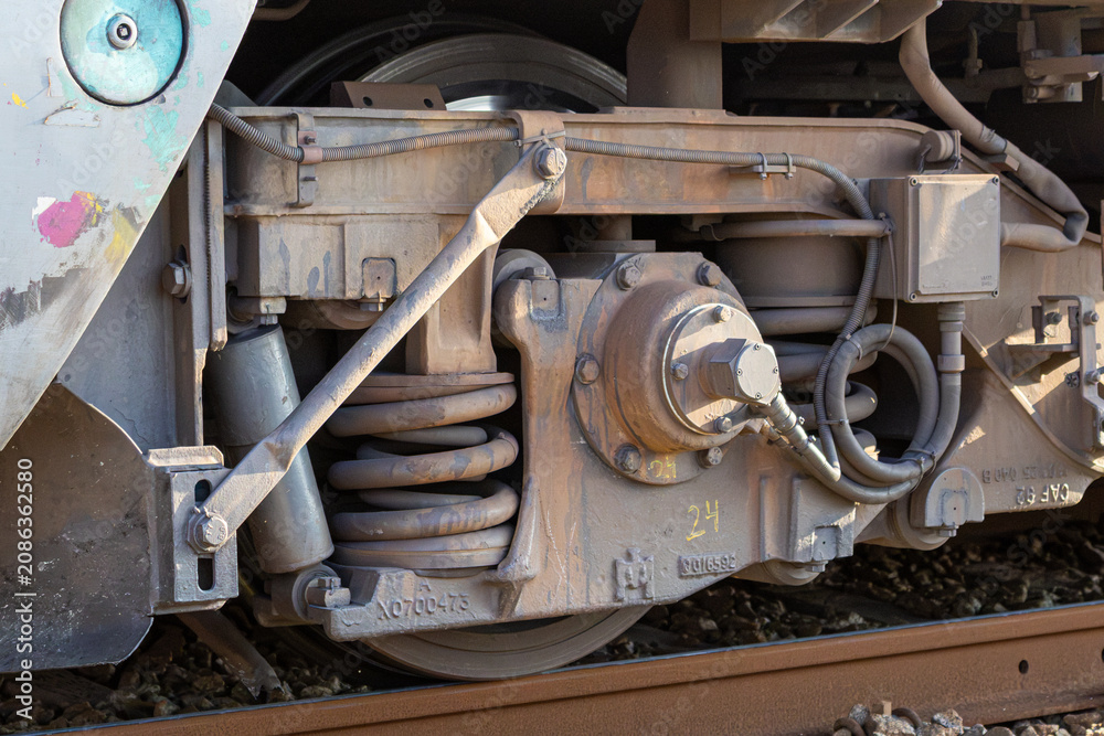 Fototapeta premium Railway Bogie Wheel and Suspension Assembly, Train Engineering, Mechanical Detail, Steel Axle, Rail Transport