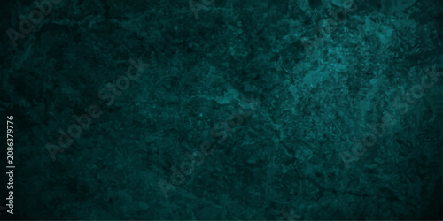 Foto A textured teal background with a grunge, distressed surface, featuring subtle scratches and mottled patterns, creating a moody and atmospheric backdrop