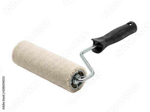 Paint roller with textured fabric sleeve and ergonomic handle for home renovation projects isolated on transparent background
