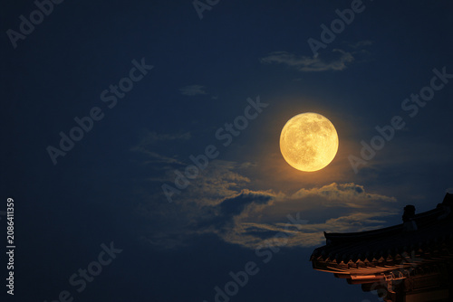 Chuseok Background with Full Moon and Korean Traditional House